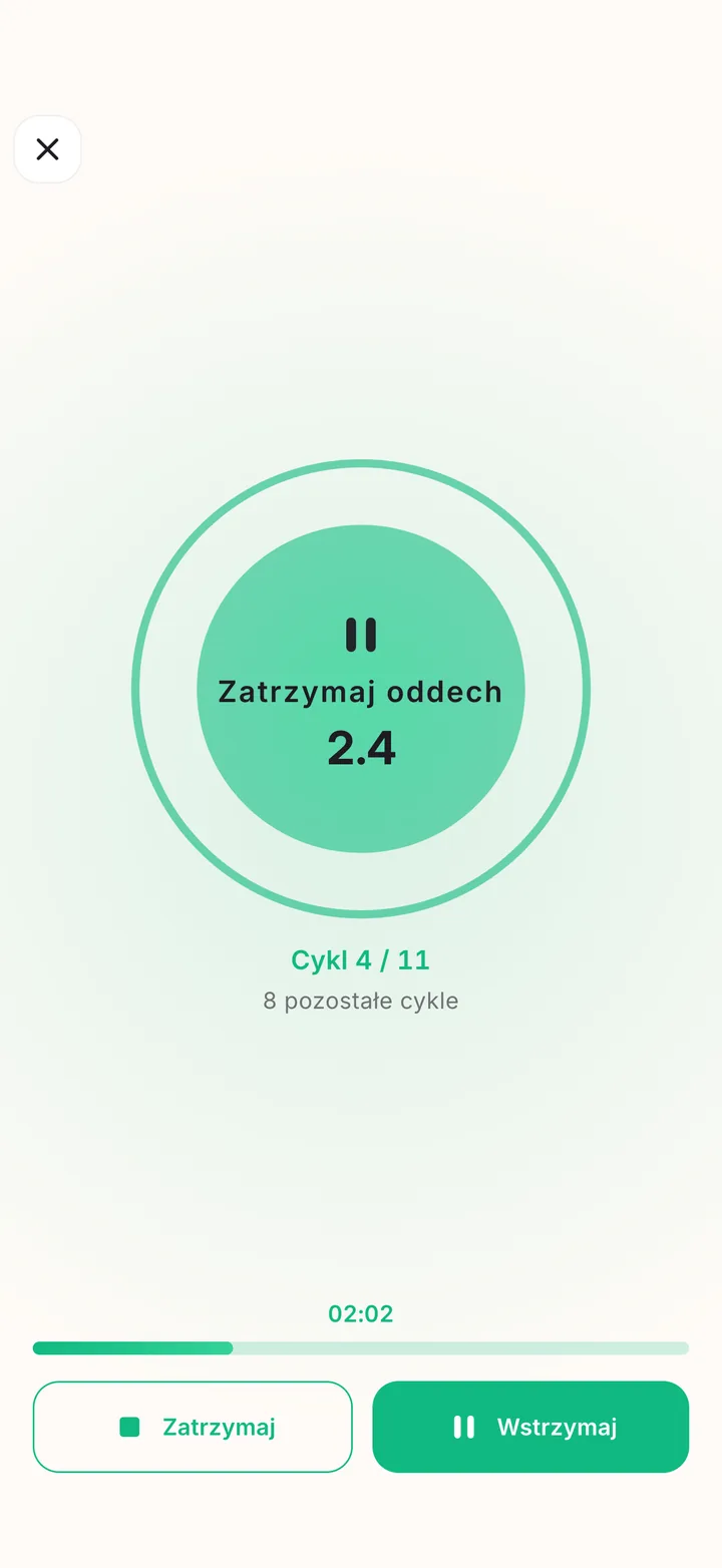Ekran prowadzonego ćwiczenia oddechowego z powoli rozszerzającym się okręgiem